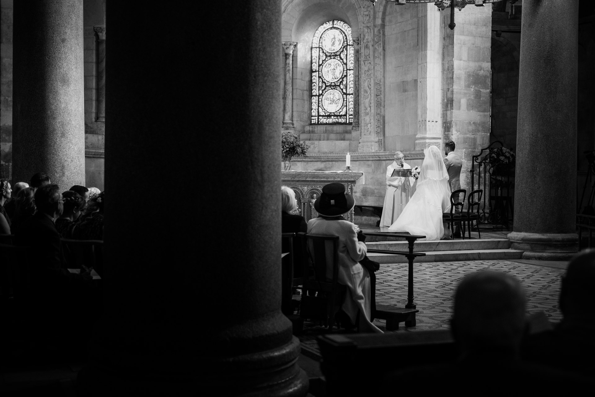 grayscale photo of people in church